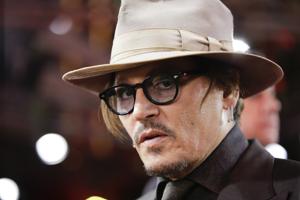 Johnny Depp arrives for the screening of the film Minamata during the 70th International Film Festival Berlin.(AP) Johnny Depp arrives for the screening of the film Minamata during the 70th International Film Festival Berlin.(AP)