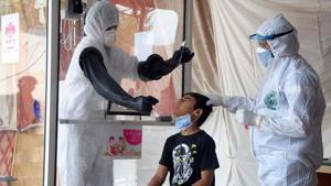 Health workers take a nasal swab sample during a testing and screening operation for the new coronavirus, in Hyderabad, Pakistan, Friday, June 26, 2020. (AP Photo/Pervez Masih)(AP) Health workers take a nasal swab sample during a testing and screening operation for the new coronavirus, in Hyderabad, Pakistan, Friday, June 26, 2020. (AP Photo/Pervez Masih)(AP)