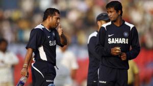 Pragyan Ojha and Sachin Tendulkar having a char.(Getty Images)