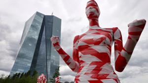 A partially incomplete display of mannequins wrapped in a barrier tape to symbolise the coronavirus disease (Covid-19) crisis, as part of the art installation "It is like it is" by German art student Dennis Josef Meseg, is seen in front of the European Central Bank (ECB) head quarters in Frankfurt, Germany June 28, 2020. (REUTERS/Kai Pfaffenbach) A partially incomplete display of mannequins wrapped in a barrier tape to symbolise the coronavirus disease (Covid-19) crisis, as part of the art installation "It is like it is" by German art student Dennis Josef Meseg, is seen in front of the European Central Bank (ECB) head quarters in Frankfurt, Germany June 28, 2020. (REUTERS/Kai Pfaffenbach)
