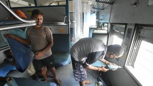 Railway technicians modify a train coach into an isolation ward for the treatment of COVID-19 affected patients in Lucknow.(PTI Photo) Railway technicians modify a train coach into an isolation ward for the treatment of COVID-19 affected patients in Lucknow.(PTI Photo)