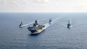 The Royal Australian Navy guided-missile frigate HMAS Parramatta (FFH 154) (L) is underway with the U.S. Navy amphibious assault ship USS America (LHA 6), the Ticonderoga-class guided-missile cruiser USS Bunker Hill (CG 52) and the Arleigh-Burke-class guided-missile destroyer USS Barry (DDG 52) in the South China Sea.(via REUTERS) The Royal Australian Navy guided-missile frigate HMAS Parramatta (FFH 154) (L) is underway with the U.S. Navy amphibious assault ship USS America (LHA 6), the Ticonderoga-class guided-missile cruiser USS Bunker Hill (CG 52) and the Arleigh-Burke-class guided-missile destroyer USS Barry (DDG 52) in the South China Sea.(via REUTERS)
