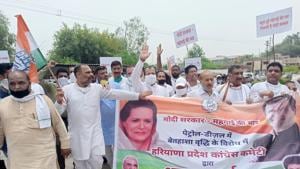 Congress workers protesting against rising prices of fuel and diesel in Ambala.(HT Photo) Congress workers protesting against rising prices of fuel and diesel in Ambala.(HT Photo)