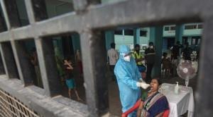 A healthcare worker collects oral swab sample of a woman for Covid-19 test, at Sane Guruji Smarak, during lockdown on Sinhagad road, in Pune.(Pratham Gokhale/HT Photo) A healthcare worker collects oral swab sample of a woman for Covid-19 test, at Sane Guruji Smarak, during lockdown on Sinhagad road, in Pune.(Pratham Gokhale/HT Photo)