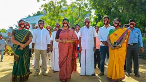 DMK MP Kanimozhi and other party workers wear masks with a message, in solidarity with Tuticorin custodial victims, in Tuticorin district.(PTI) DMK MP Kanimozhi and other party workers wear masks with a message, in solidarity with Tuticorin custodial victims, in Tuticorin district.(PTI)