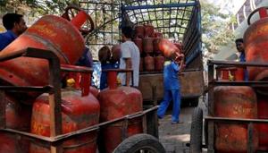 Workers load liquefied petroleum gas (LPG) cooking cylinders onto a supply truck outside a distribution centre in Mumbai.(Reuters File Photo) Workers load liquefied petroleum gas (LPG) cooking cylinders onto a supply truck outside a distribution centre in Mumbai.(Reuters File Photo)