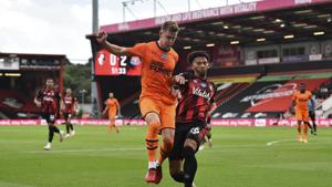 Bournemouth's Lloyd Kelly, right, duels for the all with Newcastle's Emil Krafth during the English Premier League soccer match between Bournemouth and Newcastle at Vitality Stadium in Bournemouth, England, Wednesday, July 1, 2020. (Glynn Kirk/Pool via AP)(AP) Bournemouth's Lloyd Kelly, right, duels for the all with Newcastle's Emil Krafth during the English Premier League soccer match between Bournemouth and Newcastle at Vitality Stadium in Bournemouth, England, Wednesday, July 1, 2020. (Glynn Kirk/Pool via AP)(AP)