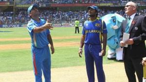 MS Dhoni of India tosses the coin for the second time with Kumar Sangakkara of Sri Lanka looking on during the 2011 ICC World Cup Final between India and Sri Lanka at Wankhede Stadium on April 2, 2011 in Mumbai, India. (Photo by Hamish Blair/Getty Images)(Getty Images) MS Dhoni of India tosses the coin for the second time with Kumar Sangakkara of Sri Lanka looking on during the 2011 ICC World Cup Final between India and Sri Lanka at Wankhede Stadium on April 2, 2011 in Mumbai, India. (Photo by Hamish Blair/Getty Images)(Getty Images)