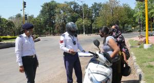 Most of the challans were issued for driving without helmet.(HT FILE) Most of the challans were issued for driving without helmet.(HT FILE)