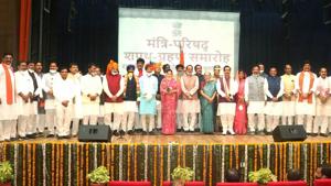 Madhya Pradesh chief minister Shivraj Chouhan is seen with the newly inducted ministers of the State Cabinet after the swearing-in ceremony at Raj Bhawan in Bhopal on Thursday.(PTI Photo) Madhya Pradesh chief minister Shivraj Chouhan is seen with the newly inducted ministers of the State Cabinet after the swearing-in ceremony at Raj Bhawan in Bhopal on Thursday.(PTI Photo)