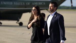 Donald Trump Jr. walks with his girlfriend Kimberly Guilfoyle after arriving at Andrews Air Force Base after traveling to Florida.(AP) Donald Trump Jr. walks with his girlfriend Kimberly Guilfoyle after arriving at Andrews Air Force Base after traveling to Florida.(AP)