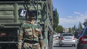 An Indian army personnel stands next to an army convoy heading towards the Line of Actual Control (LAC) in eastern Ladakh, in the backdrop of the current stand-off with Chinese troops, in Leh on June 30, 2020.(PTI Photo) An Indian army personnel stands next to an army convoy heading towards the Line of Actual Control (LAC) in eastern Ladakh, in the backdrop of the current stand-off with Chinese troops, in Leh on June 30, 2020.(PTI Photo)