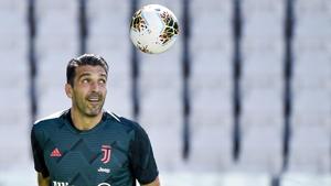 Juventus goalie Gianluigi Buffon looks at the ball.(AP) Juventus goalie Gianluigi Buffon looks at the ball.(AP)