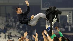 (FILES) In this file photo taken on January 17, 2020, Al-Sadd's Spanish coach Xavi is thrown into the air by his players as they celebrate winning the final match of the Qatar Cup against Al-Duhail at the Jassim Bin Hamad Stadium.(AFP) (FILES) In this file photo taken on January 17, 2020, Al-Sadd's Spanish coach Xavi is thrown into the air by his players as they celebrate winning the final match of the Qatar Cup against Al-Duhail at the Jassim Bin Hamad Stadium.(AFP)