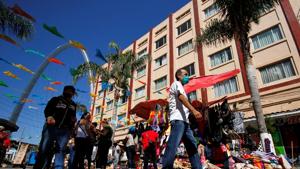 Residents and tourist are pictured at the souvenir market in the city center, as the coronavirus disease (COVID-19) outbreak continues, in Tijuana, Mexico.(REUTERS) Residents and tourist are pictured at the souvenir market in the city center, as the coronavirus disease (COVID-19) outbreak continues, in Tijuana, Mexico.(REUTERS)