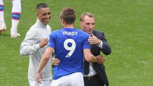 Leicester City's Jamie Vardy celebrates after the match with manager Brendan Rodgers.(REUTERS) Leicester City's Jamie Vardy celebrates after the match with manager Brendan Rodgers.(REUTERS)