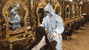 Even during this lockdown, Australia and Japan deemed haircuts an essential service.(AP file photo) Even during this lockdown, Australia and Japan deemed haircuts an essential service.(AP file photo)