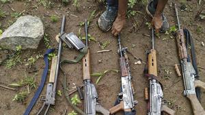 Arms and ammunition recovered after four Maoists were gunned down during an exchange of fire with security forces in a dense forest, in Kandhamal district on July 5, 2020.(PTI Photo) Arms and ammunition recovered after four Maoists were gunned down during an exchange of fire with security forces in a dense forest, in Kandhamal district on July 5, 2020.(PTI Photo)