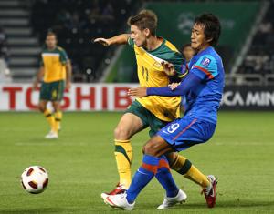 Gouramangi Singh of India tackles Nathan Burns of Australia during the AFC Asian Cup Group C match between India and Australia at Al-Sadd Stadium on January 10, 2011 in Doha, Qatar.(Getty Images) Gouramangi Singh of India tackles Nathan Burns of Australia during the AFC Asian Cup Group C match between India and Australia at Al-Sadd Stadium on January 10, 2011 in Doha, Qatar.(Getty Images)