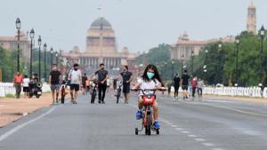 New Delhi, India - July 5, 2020: A girl rides a bicycle at Rajpath after rain showers in New Delhi, India, on Sunday, July 5, 2020.(Arvind Yadav/HT PHOTO) New Delhi, India - July 5, 2020: A girl rides a bicycle at Rajpath after rain showers in New Delhi, India, on Sunday, July 5, 2020.(Arvind Yadav/HT PHOTO)