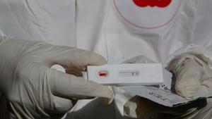 A health worker in personal protective equipment (PPE) shows a blood sample from a resident, while conducting tests for the coronavirus disease (Covid-19), in the neighbourhood of El Tejar, in La Paz, Bolivia on July 5, 2020.(Reuters File Photo) A health worker in personal protective equipment (PPE) shows a blood sample from a resident, while conducting tests for the coronavirus disease (Covid-19), in the neighbourhood of El Tejar, in La Paz, Bolivia on July 5, 2020.(Reuters File Photo)