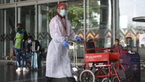 Airport staff in PPE coveralls at Netaji Subhas Chandra Bose International (NSCBI) Airport in Kolkata, West Bengal on Monday.(Samir Jana/HT File Photo) Airport staff in PPE coveralls at Netaji Subhas Chandra Bose International (NSCBI) Airport in Kolkata, West Bengal on Monday.(Samir Jana/HT File Photo)