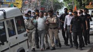 Gangster Vikas Dubey after his arrest in Madhya Pradesh’s Ujjain on Thursday.(HT Photo) Gangster Vikas Dubey after his arrest in Madhya Pradesh’s Ujjain on Thursday.(HT Photo)