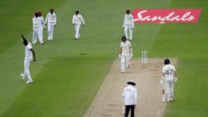 Cricket - First Test - England v West Indies - Rose Bowl Cricket Stadium, Southampton, Britain - July 9, 2020 West Indies' Jason Holder celebrates taking the wicket of England's Mark Wood, caught by West Indies' Shai Hope, as play resumes behind closed doors following the outbreak of the coronavirus disease (COVID-19) Adrian Dennis/Pool via REUTERS(REUTERS) Cricket - First Test - England v West Indies - Rose Bowl Cricket Stadium, Southampton, Britain - July 9, 2020 West Indies' Jason Holder celebrates taking the wicket of England's Mark Wood, caught by West Indies' Shai Hope, as play resumes behind closed doors following the outbreak of the coronavirus disease (COVID-19) Adrian Dennis/Pool via REUTERS(REUTERS)
