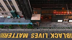 An aerial view of a Black Lives Matter mural on Fifth Avenue outside Trump Tower in New York City. It was painted by activists along with civil rights leader Al Sharpton and mayor Bill de Blasio.