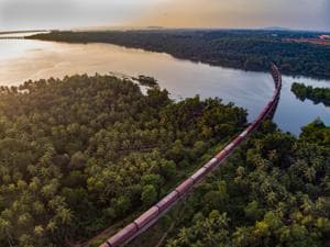 A goods train chugging along over the Sharavati river in the part of the Konkan in Karnataka.(Shutterstock) A goods train chugging along over the Sharavati river in the part of the Konkan in Karnataka.(Shutterstock)