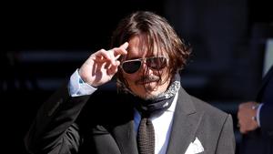Actor Johnny Depp arrives at the High Court in London, Britain July 10, 2020.(REUTERS) Actor Johnny Depp arrives at the High Court in London, Britain July 10, 2020.(REUTERS)
