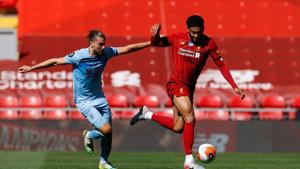 Liverpool's Joe Gomez in action with Burnley's Jay Rodriguez, as play resumes behind closed doors following the outbreak of the coronavirus disease (COVID-19) Pool via REUTERS/Phil Noble(Pool via REUTERS) Liverpool's Joe Gomez in action with Burnley's Jay Rodriguez, as play resumes behind closed doors following the outbreak of the coronavirus disease (COVID-19) Pool via REUTERS/Phil Noble(Pool via REUTERS)