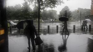 Heavy rain was falling in New York City on Friday afternoon as the centre of the storm moved northward toward upstate New York and western New England.(AP Photo) Heavy rain was falling in New York City on Friday afternoon as the centre of the storm moved northward toward upstate New York and western New England.(AP Photo)