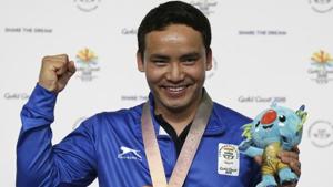 Jitu Rai of India poses with his gold medal in the men's 10m Air Pistol final at the Belmont Shooting Centre during the 2018 Commonwealth Games in Brisbane.(AP) Jitu Rai of India poses with his gold medal in the men's 10m Air Pistol final at the Belmont Shooting Centre during the 2018 Commonwealth Games in Brisbane.(AP)