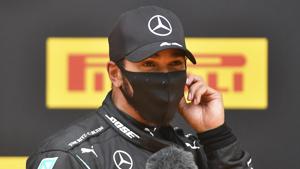 Mercedes driver Lewis Hamilton of Britain answer to media questions after clocking the fastest time.(AP) Mercedes driver Lewis Hamilton of Britain answer to media questions after clocking the fastest time.(AP)