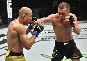 Petr Yan of Russia punches Jose Aldo of Brazil in their UFC bantamweight championship fight during the UFC 251 event at Flash Forum on UFC Fight Island on July 12, 2020 on Yas Island, Abu Dhabi, United Arab Emirates.(USA TODAY Sports) Petr Yan of Russia punches Jose Aldo of Brazil in their UFC bantamweight championship fight during the UFC 251 event at Flash Forum on UFC Fight Island on July 12, 2020 on Yas Island, Abu Dhabi, United Arab Emirates.(USA TODAY Sports)