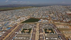 FILE - In this April 19, 2020 photo file photo, shows a large refugee camp on the Syrian side of the border with Turkey, near the town of Atma, in Idlib province, Syria.(AP) FILE - In this April 19, 2020 photo file photo, shows a large refugee camp on the Syrian side of the border with Turkey, near the town of Atma, in Idlib province, Syria.(AP)