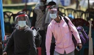 It is only if we work harmoniously as a society that we can save ourselves from the virus and from economic disaster(AP) It is only if we work harmoniously as a society that we can save ourselves from the virus and from economic disaster(AP)