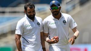 Mohammed Shami and Jasprit Bumrah have a word.(Getty Images) Mohammed Shami and Jasprit Bumrah have a word.(Getty Images)