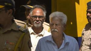 P Varavara Rao and Sudhir Dhawale, two of the nine accused in the Bhima Koregaon violence case, are escorted by police to court for a hearing, in Mumbai.(PTI file photo) P Varavara Rao and Sudhir Dhawale, two of the nine accused in the Bhima Koregaon violence case, are escorted by police to court for a hearing, in Mumbai.(PTI file photo)