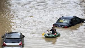The floodwaters have inundated towns across southern and central China and prompted emergency workers to shore-up embankments and dig channels to release overflow.(AP Photo) The floodwaters have inundated towns across southern and central China and prompted emergency workers to shore-up embankments and dig channels to release overflow.(AP Photo)