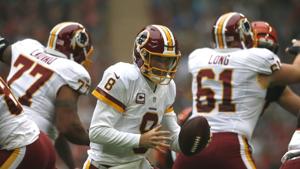 Kirk Cousins #8 of the Washington Redskins looks to hand off the ball during the NFL International Series game against the Cincinnati Bengals at Wembley Stadium on October 30, 2016 in London, England.(Getty Images) Kirk Cousins #8 of the Washington Redskins looks to hand off the ball during the NFL International Series game against the Cincinnati Bengals at Wembley Stadium on October 30, 2016 in London, England.(Getty Images)