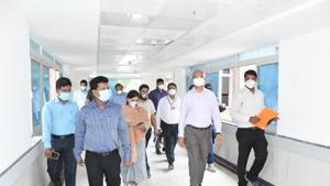 Municipal commissioner Vikram Kumar (second from right) and district collector Naval Kishore Ram (second from left) during a visit to the hospital facility in Bibwewadi, on Monday.(HT PHOTO) Municipal commissioner Vikram Kumar (second from right) and district collector Naval Kishore Ram (second from left) during a visit to the hospital facility in Bibwewadi, on Monday.(HT PHOTO)