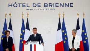 French President Emmanuel Macron is flanked by French Defence Minister Florence Parly and French Junior Minister for Veterans Genevieve Darrieussecq as he gives a speech to the French Military Forces at the Hotel de Brienne in Paris, France, July 13, 2020.(REUTERS/Gonzalo Fuentes/Pool) French President Emmanuel Macron is flanked by French Defence Minister Florence Parly and French Junior Minister for Veterans Genevieve Darrieussecq as he gives a speech to the French Military Forces at the Hotel de Brienne in Paris, France, July 13, 2020.(REUTERS/Gonzalo Fuentes/Pool)