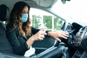 When a car is locked with an alcohol based sanitiser bottle kept inside for long, avoid smoking when you go back to the car.(Photo: Shutterstock) When a car is locked with an alcohol based sanitiser bottle kept inside for long, avoid smoking when you go back to the car.(Photo: Shutterstock)