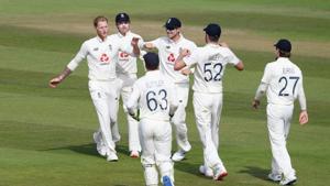 England's Ben Stokes celebrates taking the wicket of West Indies' Shane Dowrich.(REUTERS) England's Ben Stokes celebrates taking the wicket of West Indies' Shane Dowrich.(REUTERS)