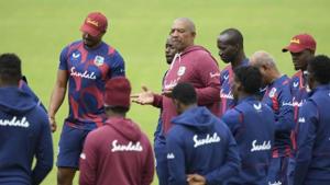 Southampton : West Indies coach Phil Simmons, centre, speaks to his team members during a nets session at the Ageas Bowl in Southampton, England, Tuesday July 7, 2020. West Indies play their first Test match against England on upcoming July 8-12.(AP) Southampton : West Indies coach Phil Simmons, centre, speaks to his team members during a nets session at the Ageas Bowl in Southampton, England, Tuesday July 7, 2020. West Indies play their first Test match against England on upcoming July 8-12.(AP)