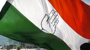 Image for representation: Supporters of Congress holding a huge flag.(Reuters) Image for representation: Supporters of Congress holding a huge flag.(Reuters)