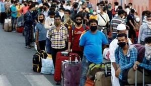 Migrant workers and their families wait in lines outside a railway station to board a train to their home state West Bengal, after authorities eased lockdown restrictions that were imposed to slow the spread of the coronavirus disease (Covid-19) in Ahmedabad on June 18, 2020.(Reuters File Photo) Migrant workers and their families wait in lines outside a railway station to board a train to their home state West Bengal, after authorities eased lockdown restrictions that were imposed to slow the spread of the coronavirus disease (Covid-19) in Ahmedabad on June 18, 2020.(Reuters File Photo)