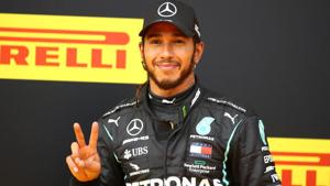 Mercedes' Lewis Hamilton celebrates winning the race.(REUTERS) Mercedes' Lewis Hamilton celebrates winning the race.(REUTERS)